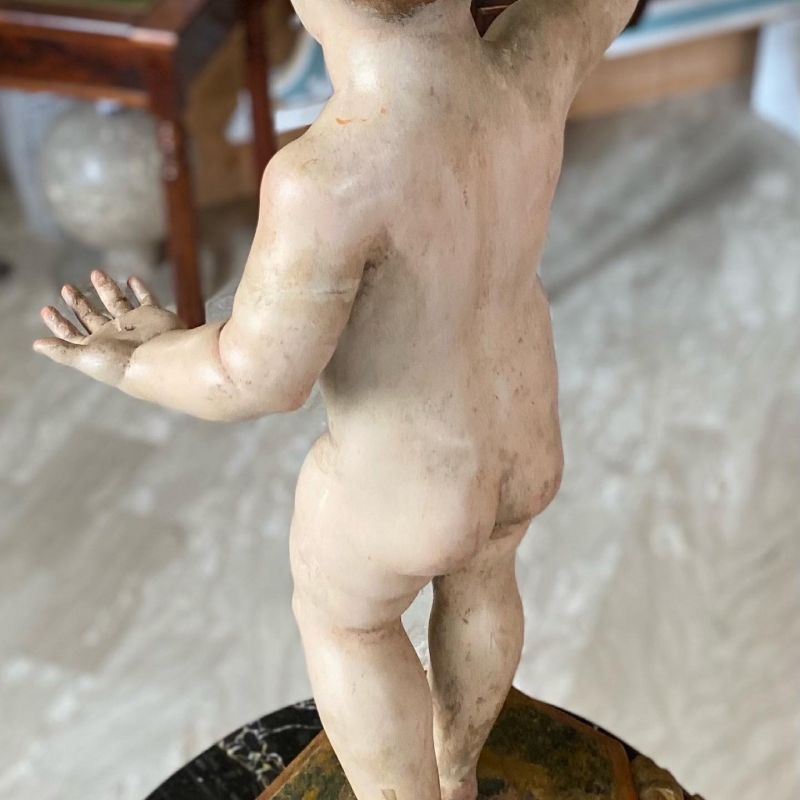 IL PRIMO RE. Bambinello ligneo antico